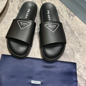 Prada Platform Slides | Black Leather Triangle Logo